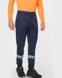 Pantalon personnalisable WK. DESIGNED TO WORK Pantalon cargo unisexe avec bas élastiqué et bande réfléchissante