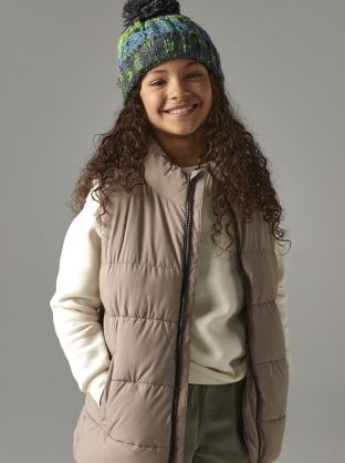 Bonnet enfant à pompon tire-bouchon